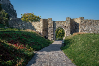 Old ruins against clear blue sky