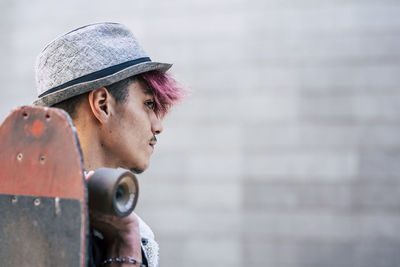 Portrait of young man looking away
