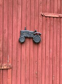 Close-up of door knocker on wood