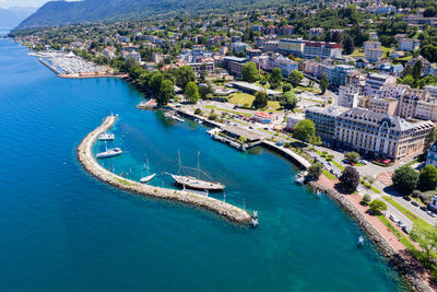High angle view of boats in city