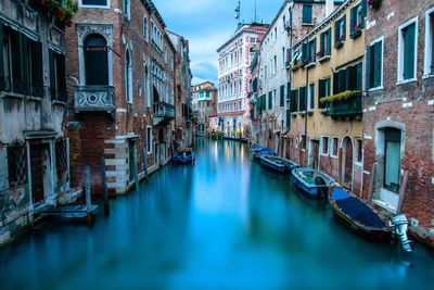 View of canal along buildings