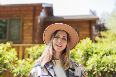 Young stylish caucasian woman 30-35 years old wearing casual clothing shirt and cowboy hat 