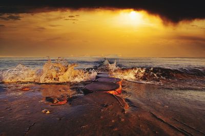 Scenic view of sea against sky during sunset