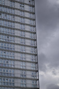 Low angle view of skyscraper against sky