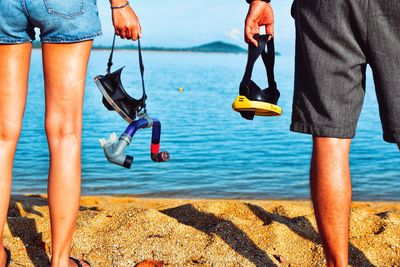 Low section of people on beach