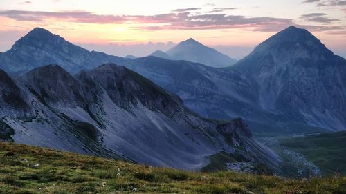 Scenic view of mountains against sky during sunset