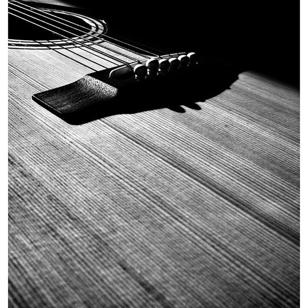 indoors, close-up, wood - material, still life, table, part of, high angle view, music, musical instrument, pattern, one person, person, selective focus, auto post production filter, arts culture and entertainment, paper, wooden, pencil, transfer print