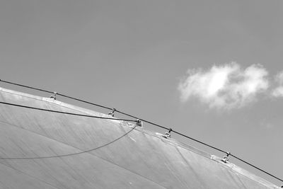 Low angle view of cable car against sky during winter