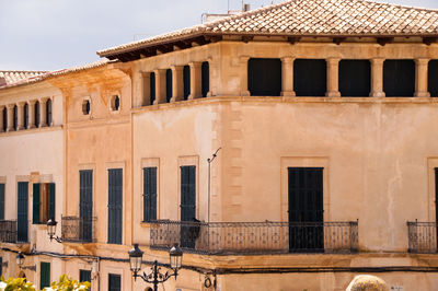 Low angle view of old building against sky