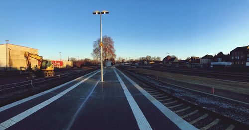 View of railroad tracks against clear sky