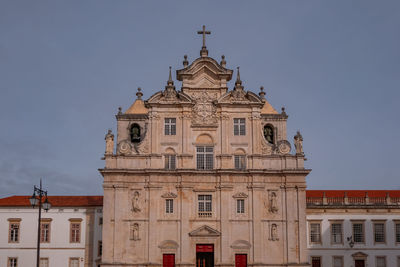 Low angle view of building against blue sky