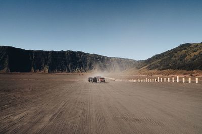 Scenic view of road against clear sky