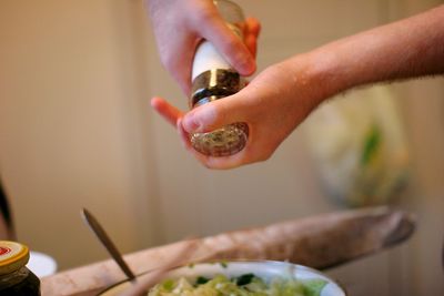 Close-up of hand holding ice cream