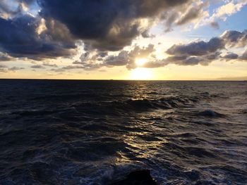 Scenic view of sea against sky during sunset