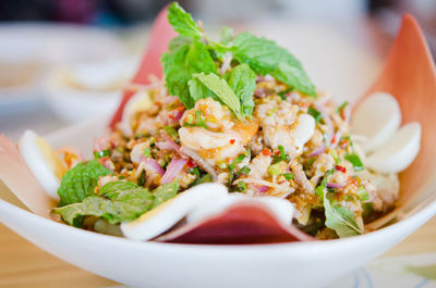 Close-up of salad in bowl on table