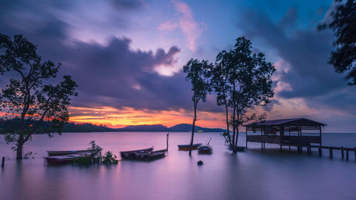 Scenic view of sea against sky at sunset