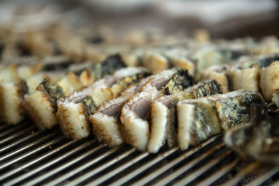 Close-up of meat on barbecue grill