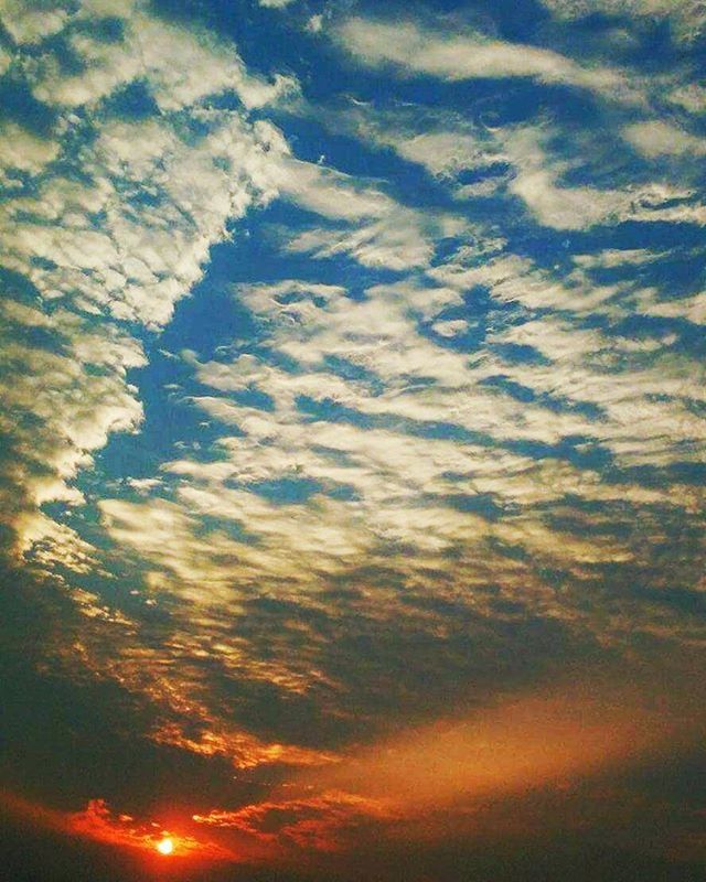 sky, sunset, cloud - sky, beauty in nature, scenics, low angle view, tranquility, tranquil scene, sky only, nature, idyllic, cloudscape, backgrounds, cloudy, orange color, cloud, full frame, dramatic sky, majestic, outdoors