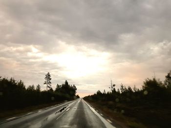 Road against sky during sunset