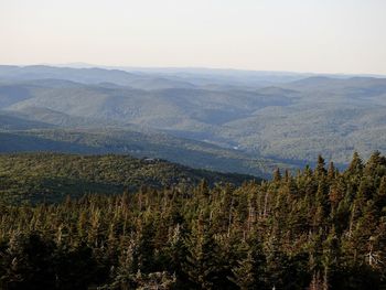 High angle view of trees and mountains against sky