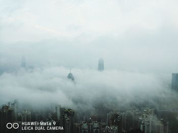 Aerial view of city in foggy weather