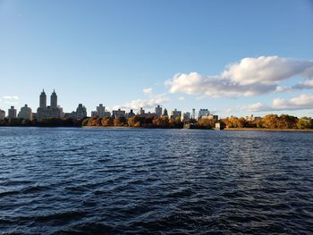 Buildings in city against sky