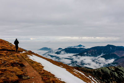 Scenic view of snowcapped mountains against sky