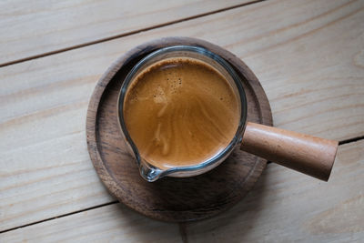 High angle view of coffee on table