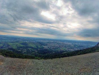 Aerial view of landscape against cloudy sky