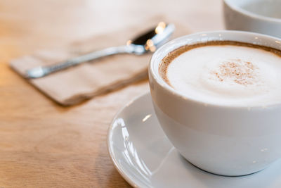 Coffee cup on table