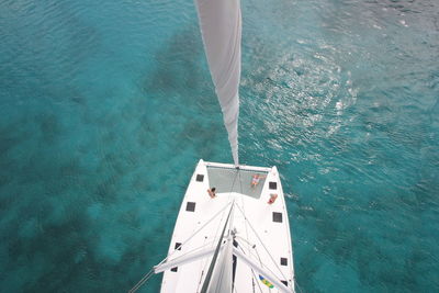 High angle view of sailboat sailing in sea