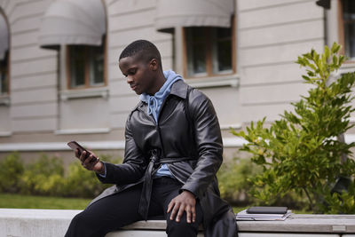 Young man using cell phone