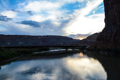 Scenic view of mountains against cloudy sky