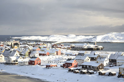 Scenic view of town against sky