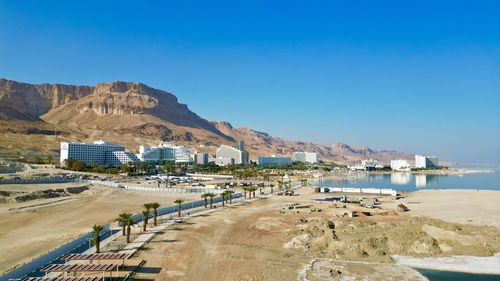 High angle view of beach against clear blue sky
