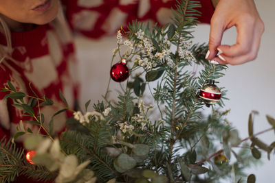 Hand holding christmas decoration