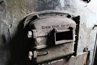 Close-up of old machine part