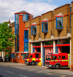 Fire brigade station with fire engines, islington, london uk