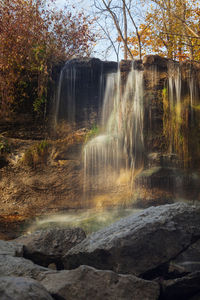 View of waterfall in forest