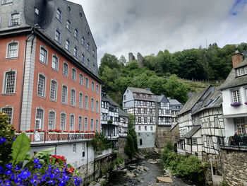 Buildings in city against sky