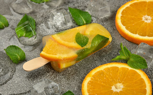 Close-up of orange slices on table