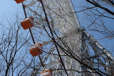 Low angle view of bare tree against sky