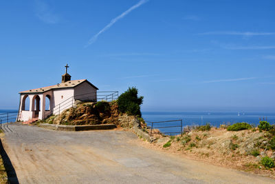 Scenic view of sea against blue sky