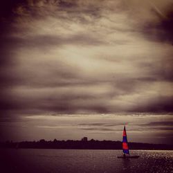 View of river against cloudy sky