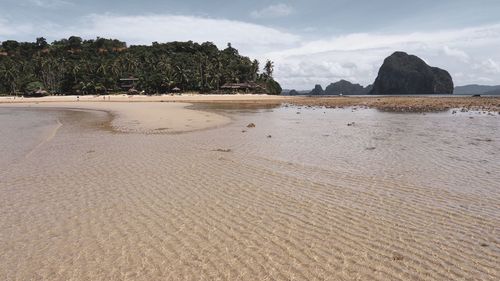 Scenic view of beach against sky