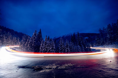 Light trails on road at night