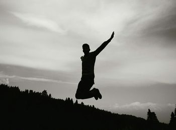 Silhouette of young man