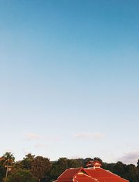 Scenic view of field against clear blue sky