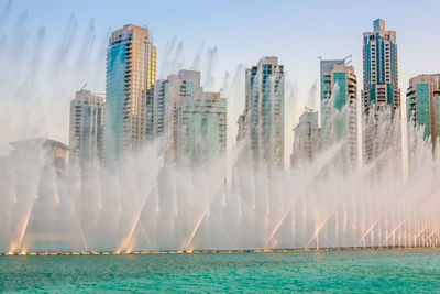 Panoramic view of city at waterfront