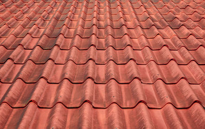 Details of the red tiles of a roof